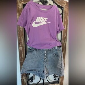 Girls outfit size 4 Jean shorts and size xl tee shirt.